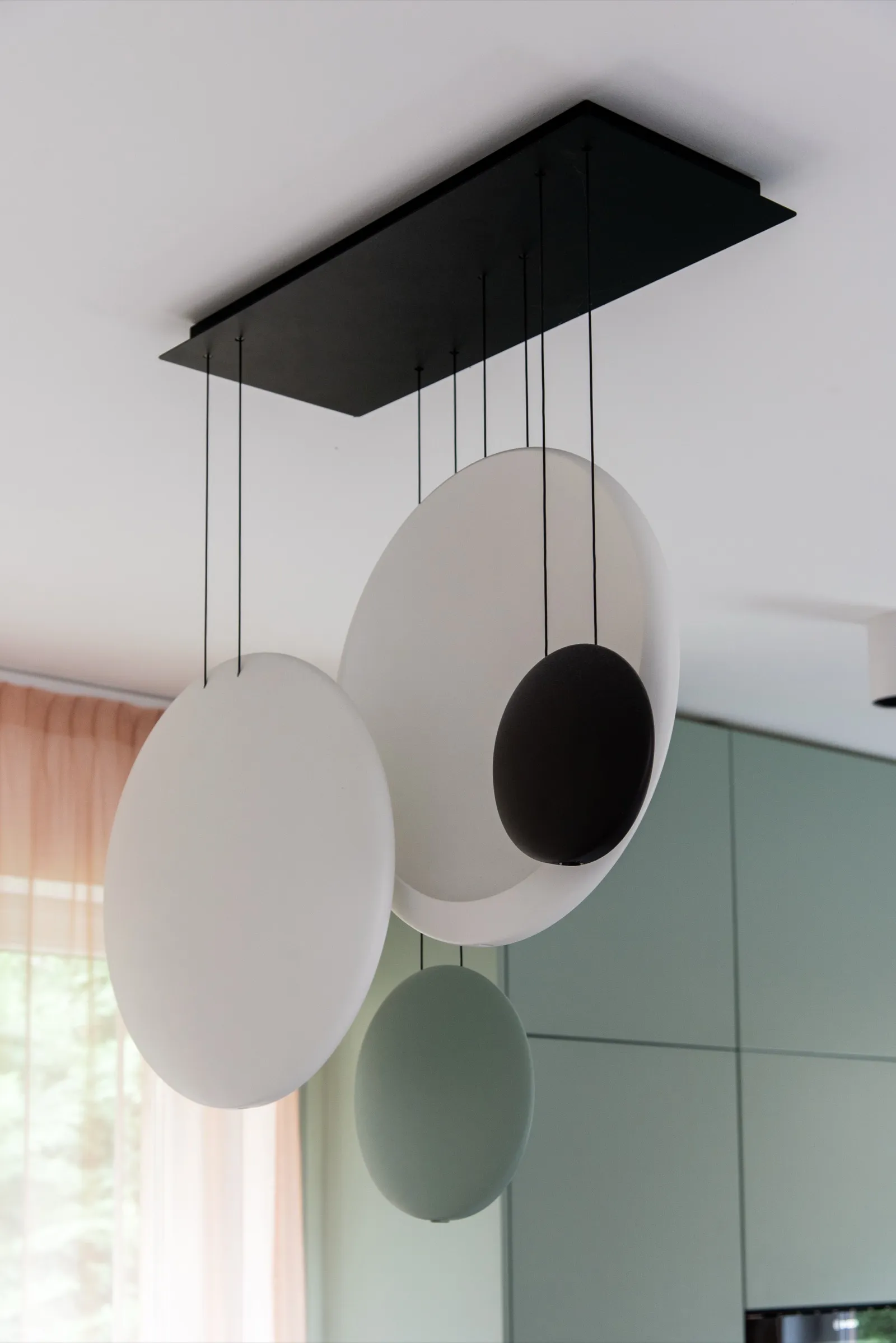 Artistic disc light fixture