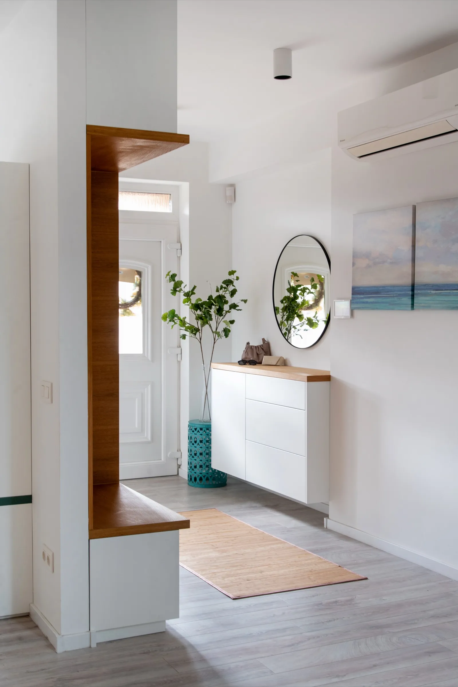 Dining area with geometric pendant
