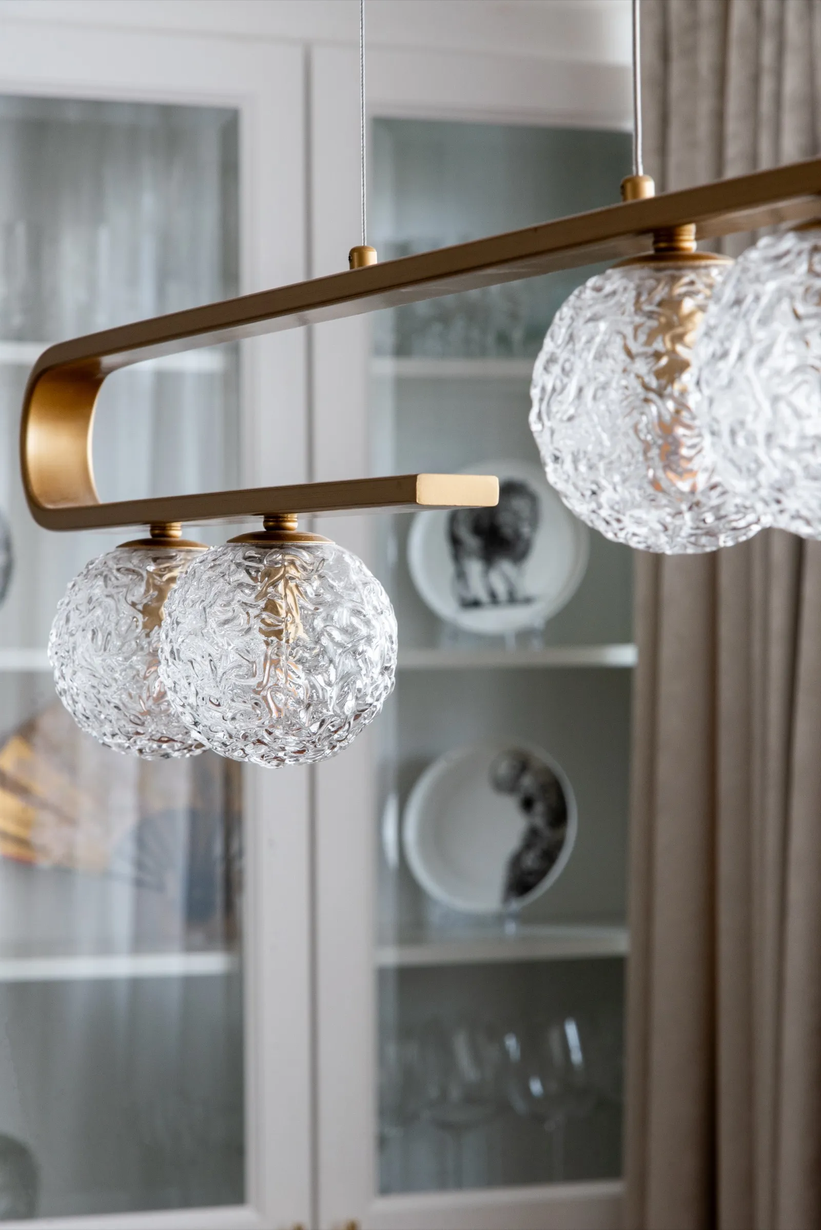 Gold accents on fixtures and handles