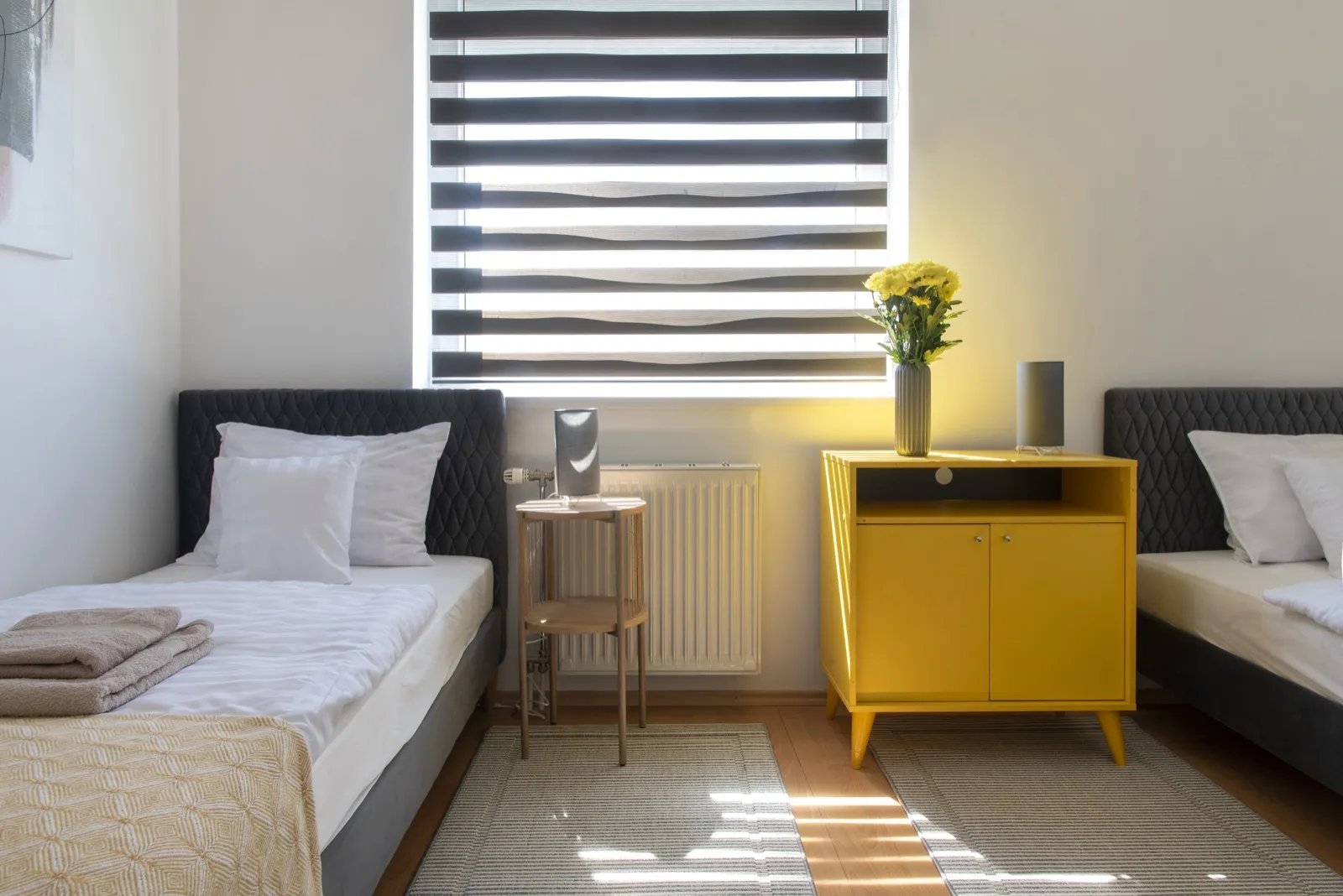 Deep green sofa and nature motifs