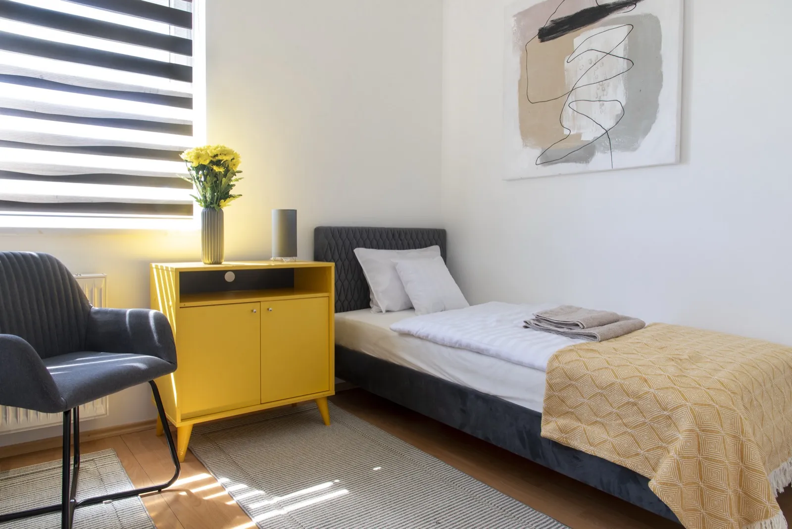 Green kitchen with gold handles