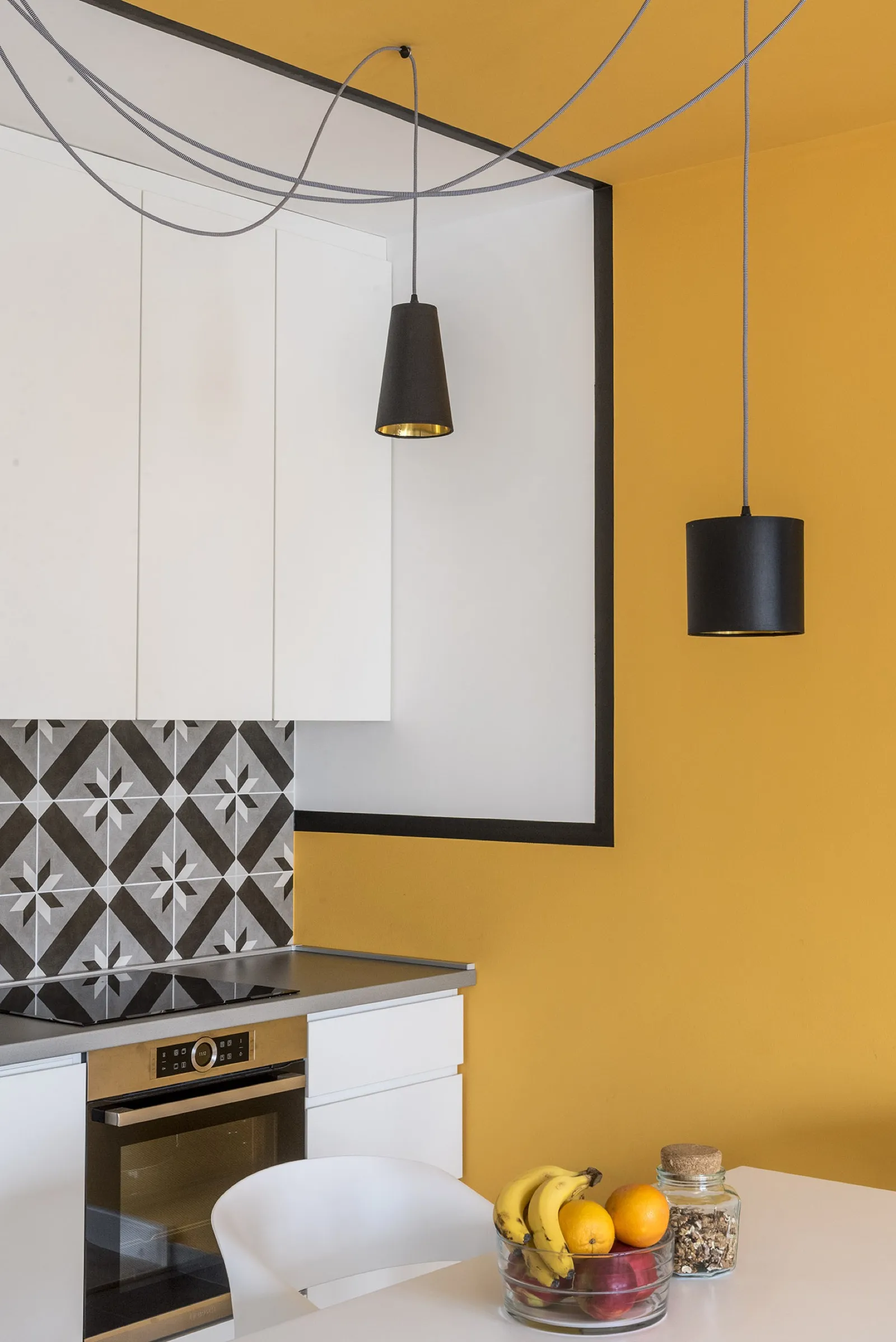 Custom wallpaper detail with ochre and terracotta