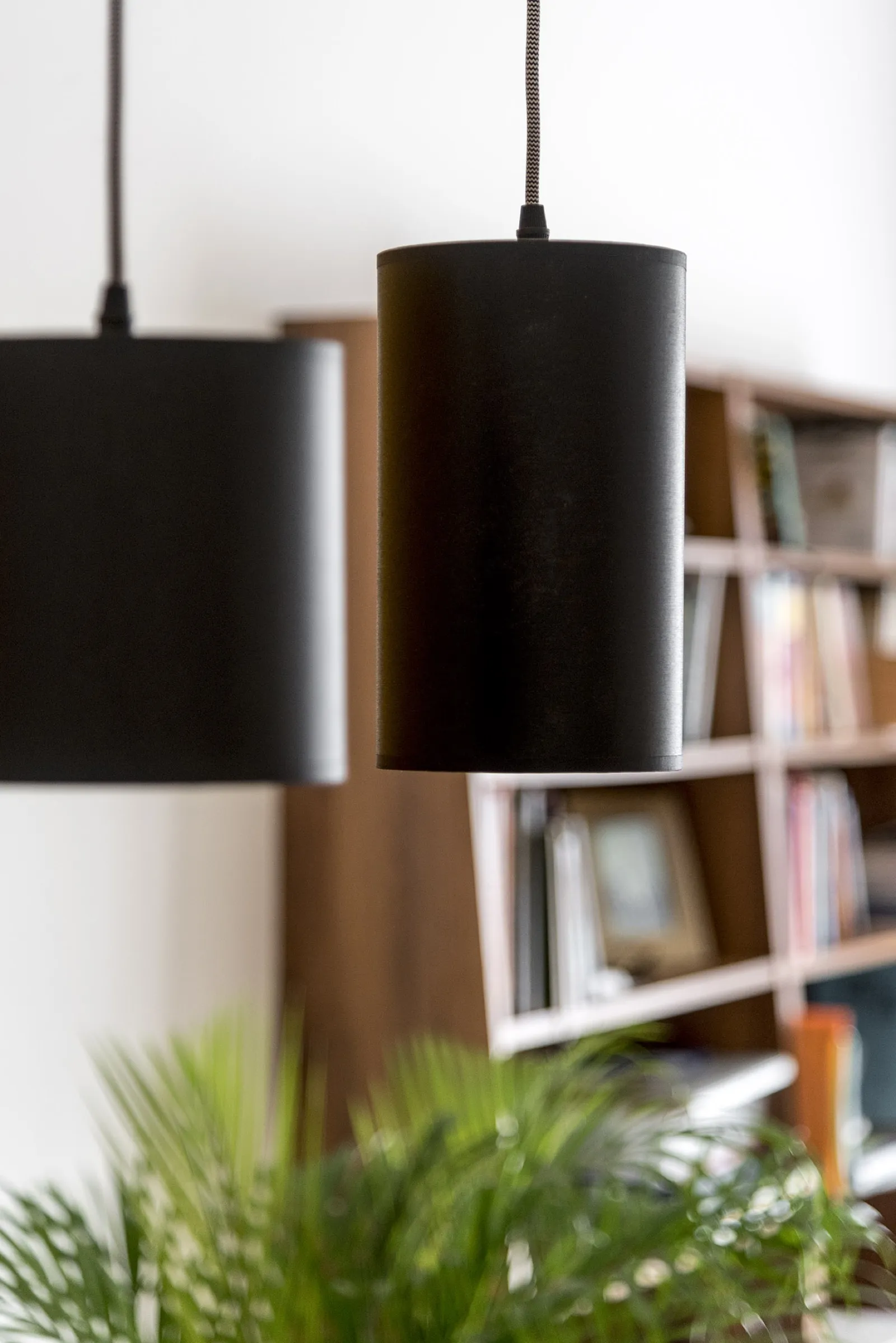 Black-and-white photographs on the wall